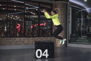 A woman doing a HIIT workout - Darren Yaw released