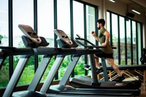 A man jogging on a treadmill - Dato Darren Yaw